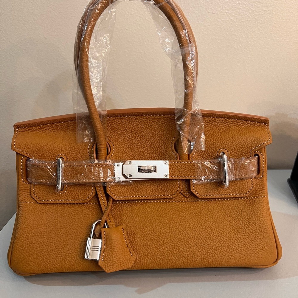 Genuine Leather Shoulder Bag, size 29, with silver hardware.